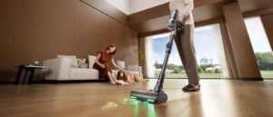 Multi-surface cordless vacuum cleaning hardwood floors, carpets, and tile in an Arizona home, showcasing powerful all-around performance