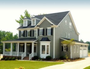 First-time homebuyer signing documents with a real estate agent in 2026